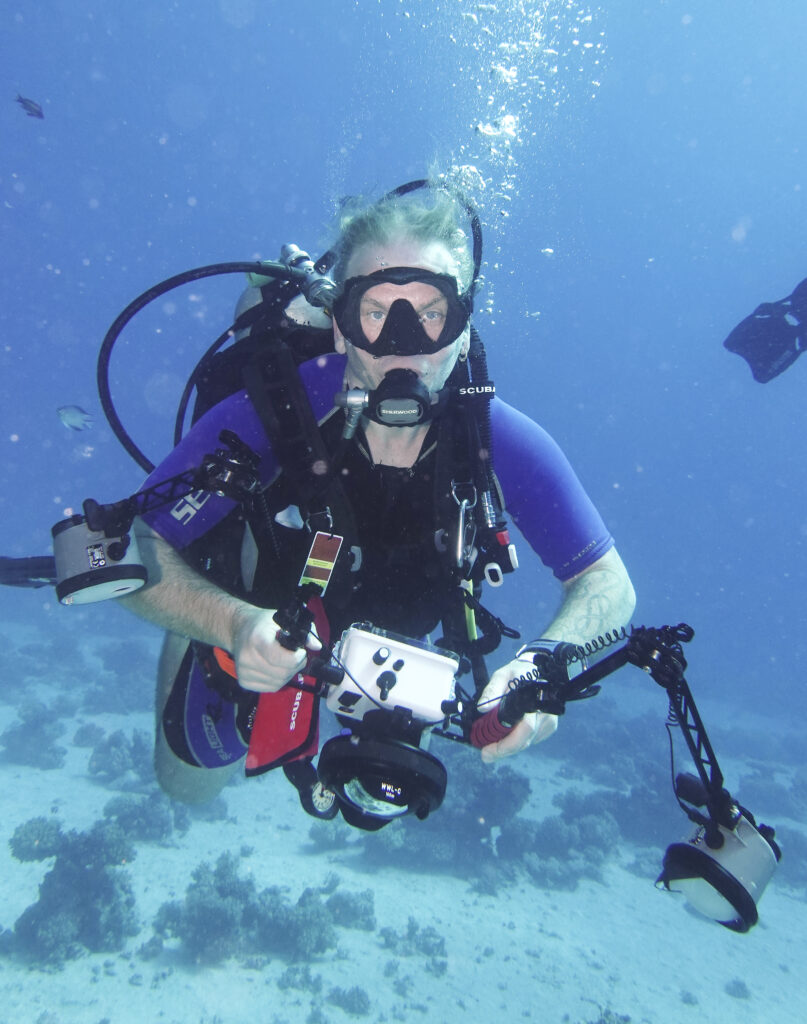 Heiko underwater with camera